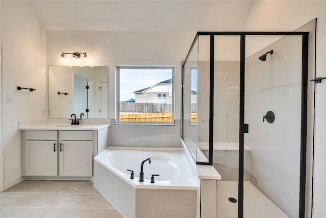 bathroom with separate shower and tub, tile patterned flooring, and vanity