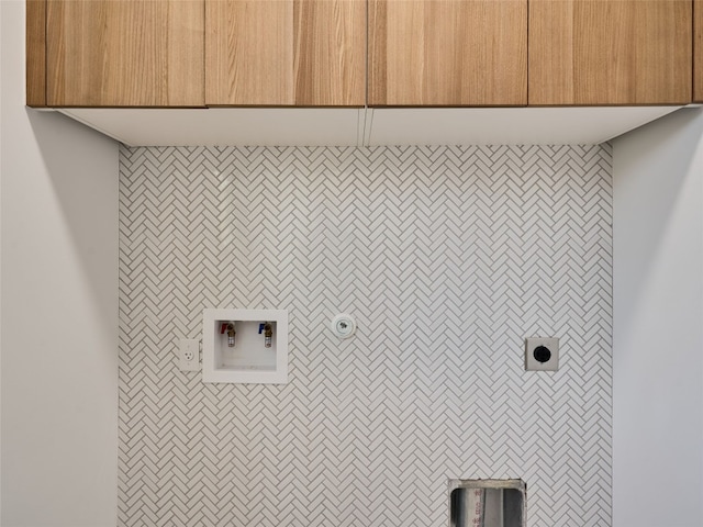 laundry room featuring laundry area and hookup for an electric dryer