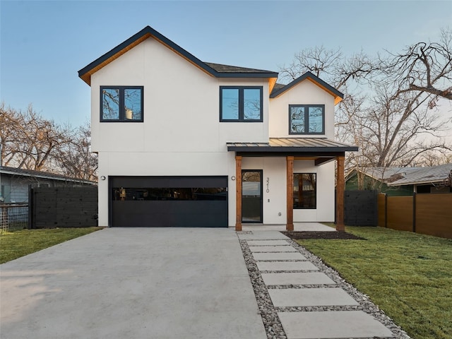 contemporary house featuring driveway, a standing seam roof, a garage, and fence