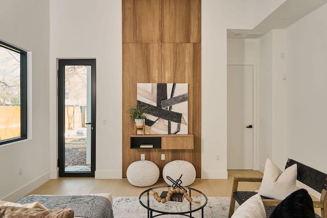 living room with wood finished floors and baseboards