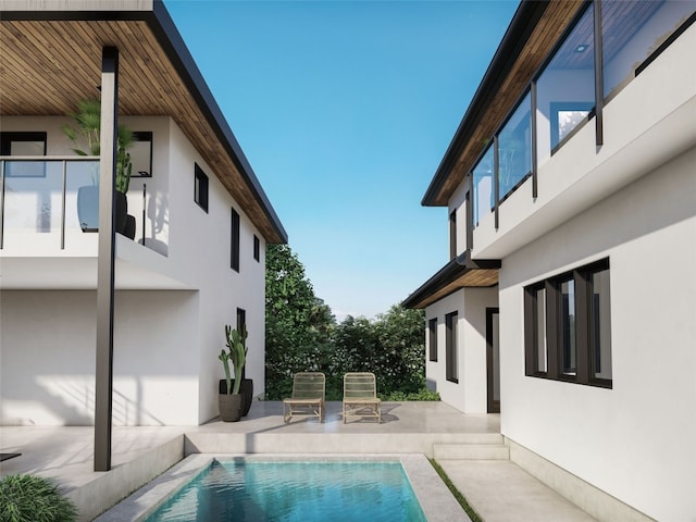 view of pool featuring a patio area