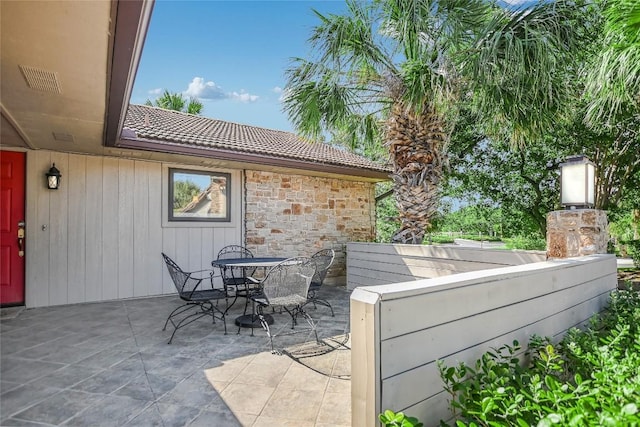 100 Bay Point Dr Unit 13, Horseshoe Bay, TX 78657 - view of patio / terrace with outdoor dining space