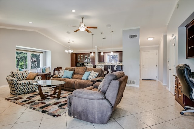 100 Bay Point Dr Unit 13, Horseshoe Bay, TX 78657 - living room featuring ceiling fan, healthy amount of natural light, light tile patterned flooring, lofted ceiling, and a chandelier