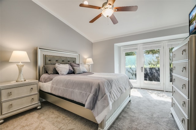 carpeted bedroom with access to outside, lofted ceiling, ornamental molding, and ceiling fan