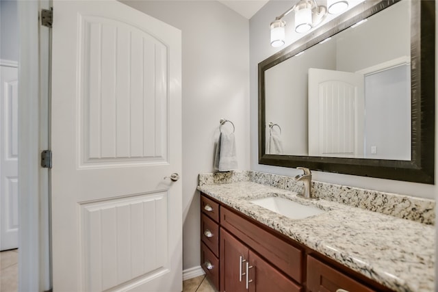 bathroom featuring tile patterned floors and vanity