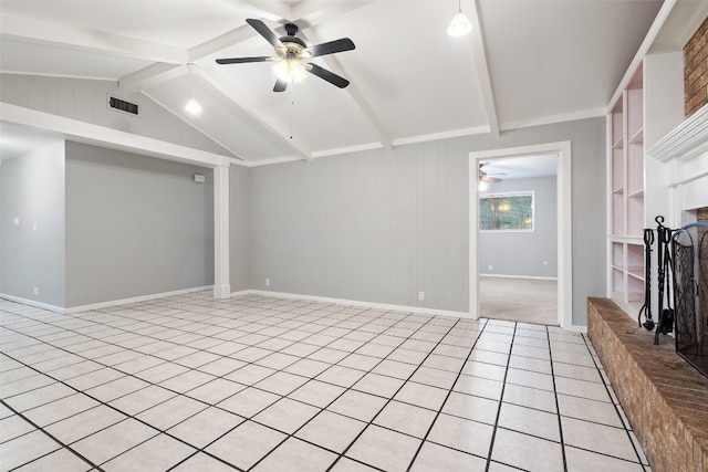 unfurnished living room with vaulted ceiling with beams, ceiling fan, and light tile patterned floors