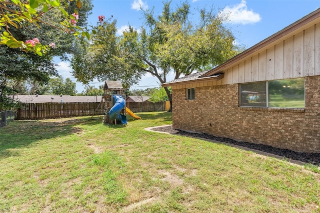 view of yard with a playground