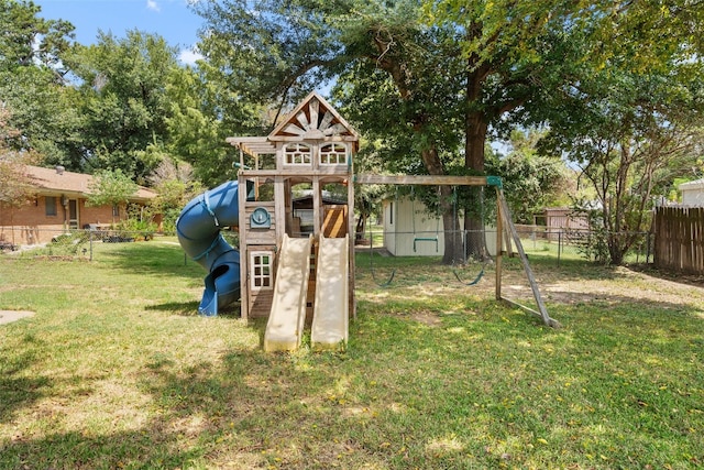 view of play area featuring a lawn