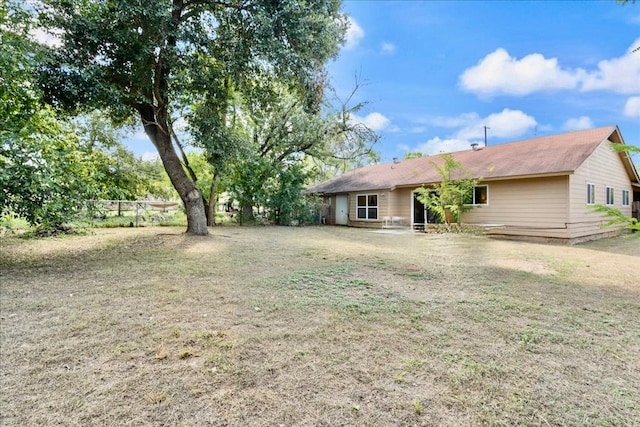 view of front of home with a front yard