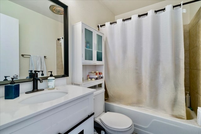 full bathroom with shower / bathtub combination with curtain, vanity, and toilet