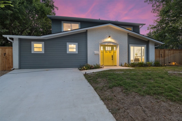 view of front property with a lawn