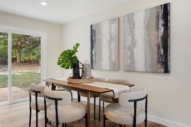 dining area featuring hardwood / wood-style floors