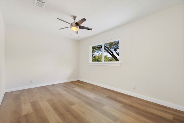 unfurnished room featuring ceiling fan and light hardwood / wood-style floors