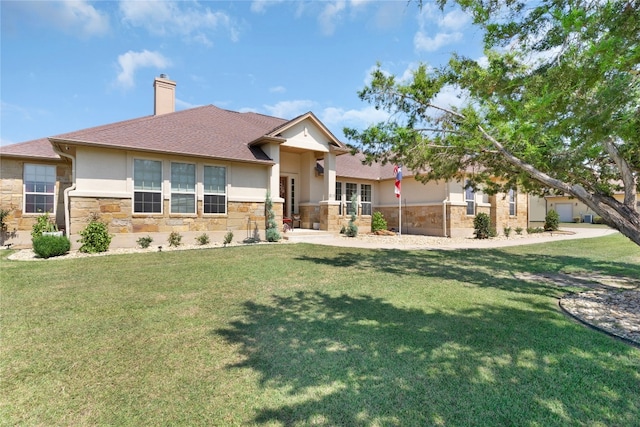 view of front facade with a front lawn