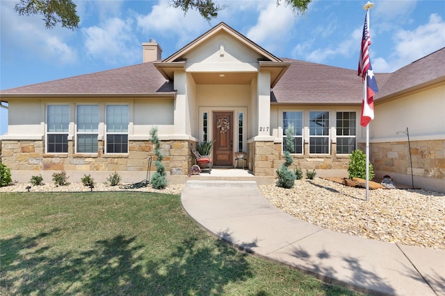 view of front of house featuring a front yard