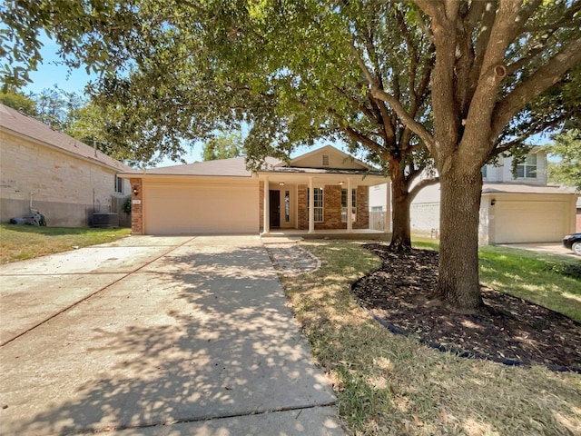 ranch-style home with central air condition unit