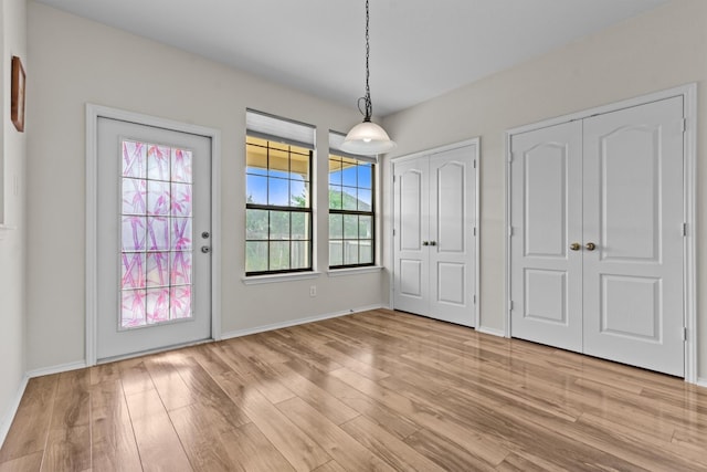 interior space with light hardwood / wood-style flooring