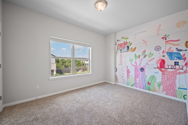 spare room with carpet floors