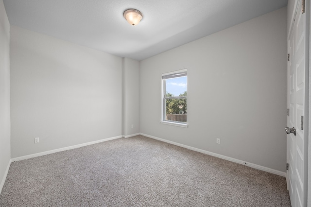 spare room with carpet flooring