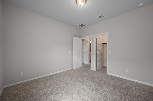 unfurnished bedroom with carpet floors