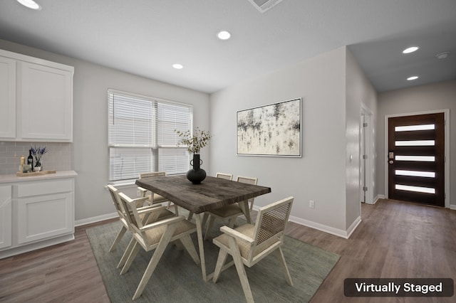 dining room featuring dark hardwood / wood-style floors