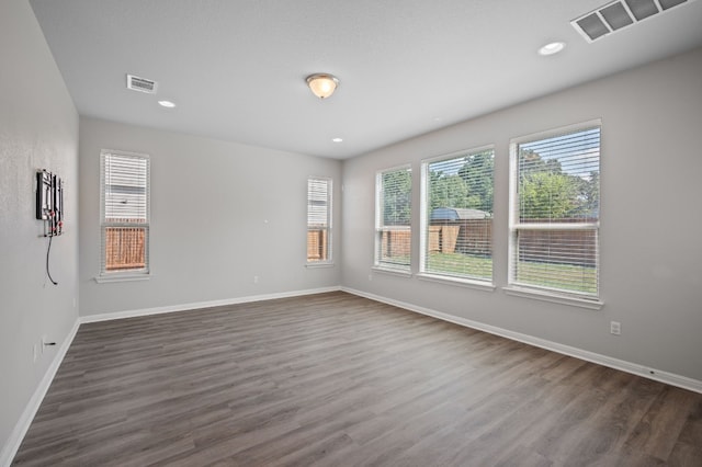112 Driftwood Hills Way, Georgetown, TX 78633 - unfurnished room featuring dark wood-type flooring, baseboards, and recessed lighting
