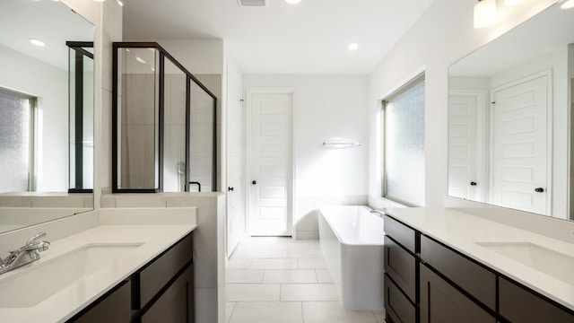 full bath featuring visible vents, a sink, a washtub, and a shower stall