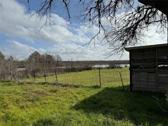 view of yard with a water view