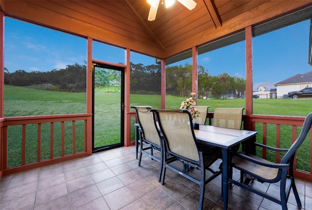 sunroom featuring wooden ceiling, vaulted ceiling, and ceiling fan