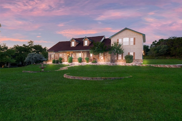 view of front facade with a lawn