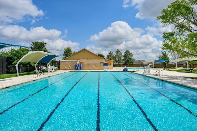 view of pool featuring a patio area