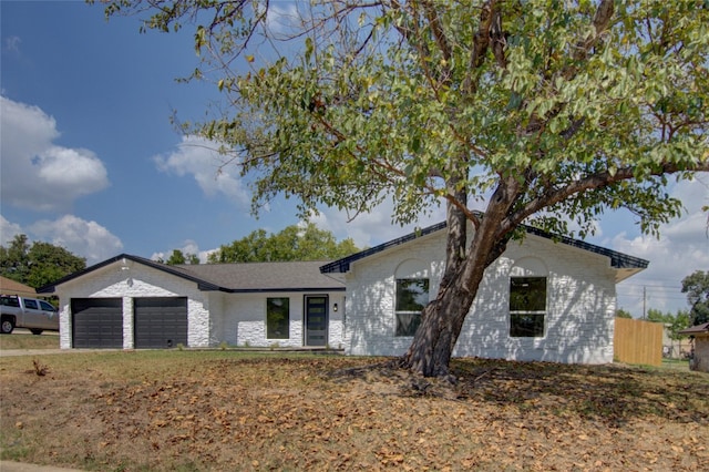 view of front of home with a garage