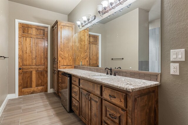 bathroom featuring hardwood / wood-style floors and vanity