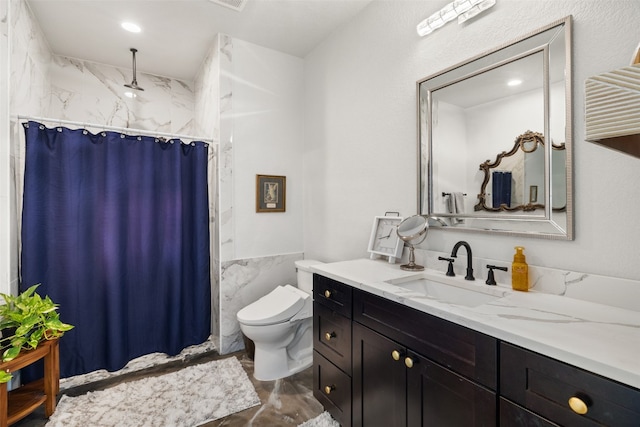 bathroom with a shower with shower curtain, tile walls, vanity, and toilet