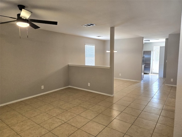 unfurnished room with ceiling fan