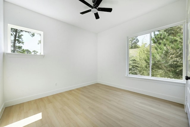 unfurnished room with light hardwood / wood-style floors and ceiling fan