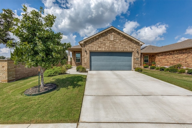 view of front facade featuring a garage and a front lawn