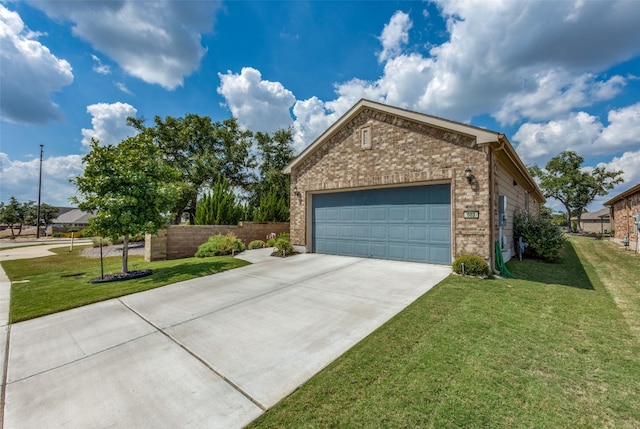 view of front facade featuring a garage and a front lawn