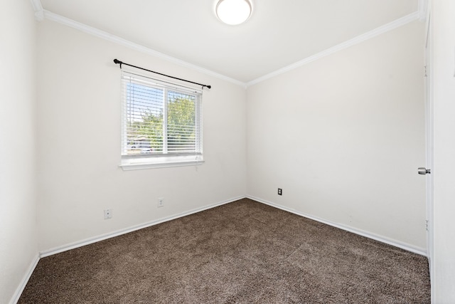 unfurnished room with dark carpet and ornamental molding