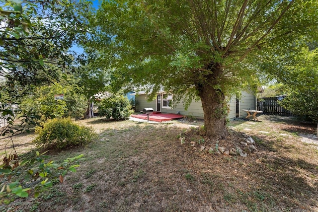 view of yard featuring a deck