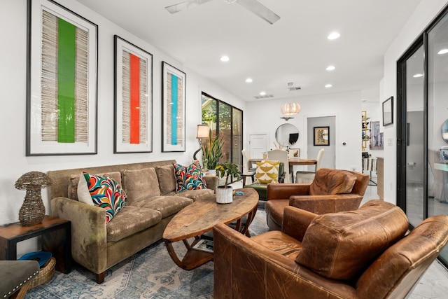 living area with visible vents and recessed lighting