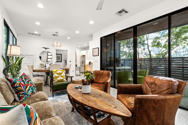 1001 Juanita St, Austin, TX 78704 - living room featuring recessed lighting and a ceiling fan
