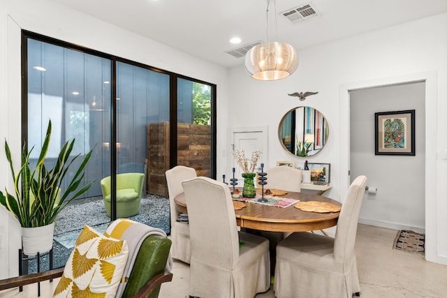 1001 Juanita St, Austin, TX 78704 - dining space with concrete floors and recessed lighting