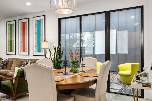 dining room featuring recessed lighting