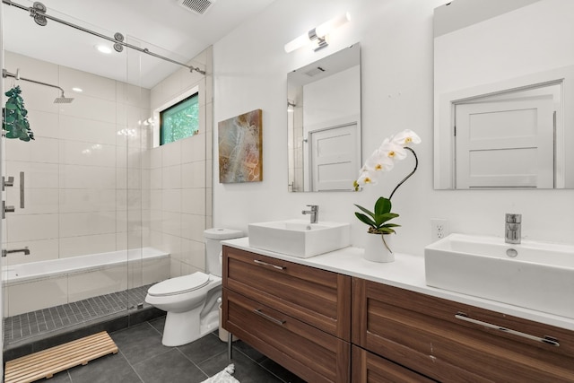 1001 Juanita St, Austin, TX 78704 - bathroom featuring double vanity, tile patterned flooring, and a stall shower