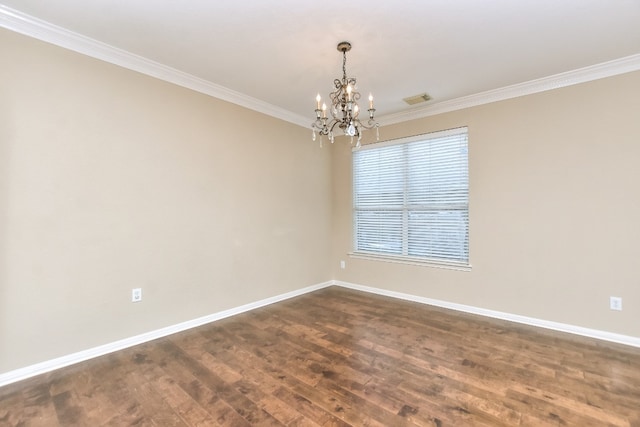 unfurnished room featuring ornamental molding, an inviting chandelier, and dark hardwood / wood-style flooring