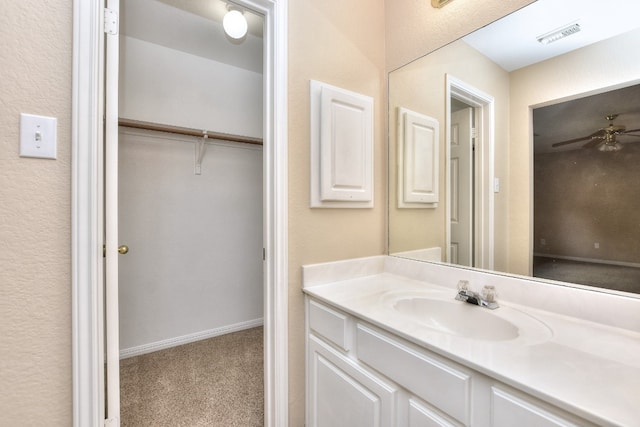 bathroom featuring vanity and ceiling fan