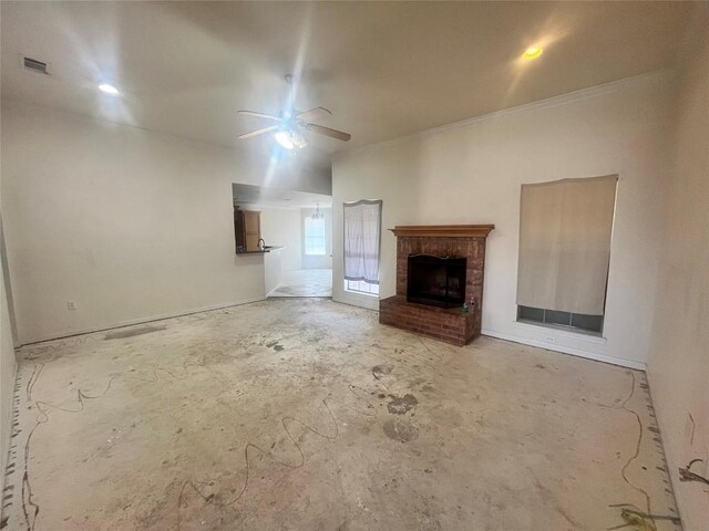 2207 Gail Dr, Copperas Cove, TX 76522 - unfurnished living room featuring ceiling fan, crown molding, a fireplace, and unfinished concrete flooring