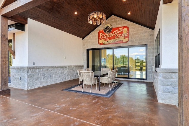 dining space with high vaulted ceiling, beam ceiling, and wooden ceiling