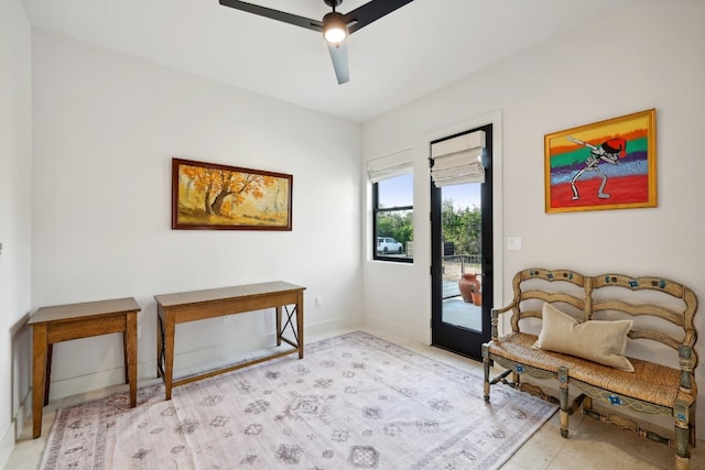 interior space featuring ceiling fan